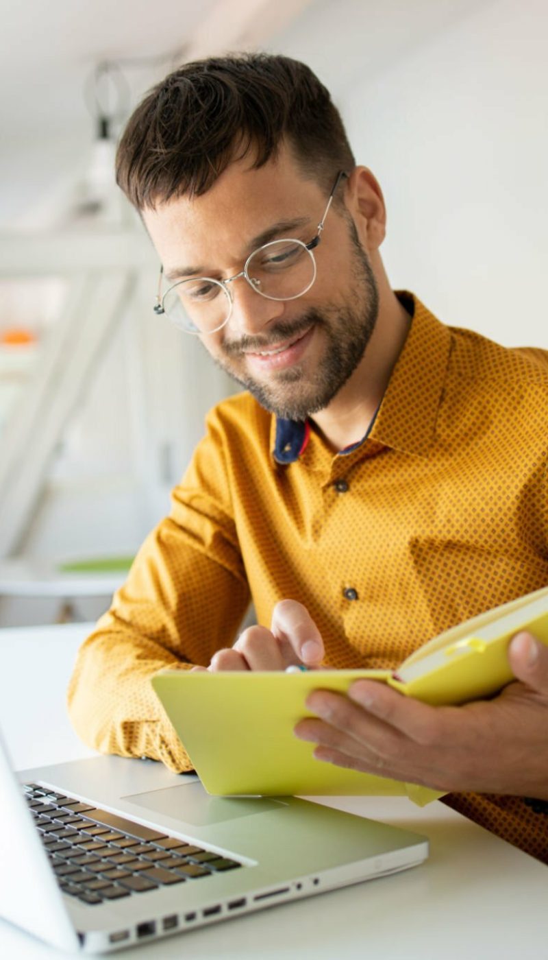 Young businessman working from home